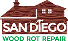A wooden sign with the words san diego wood rot repair written in white.